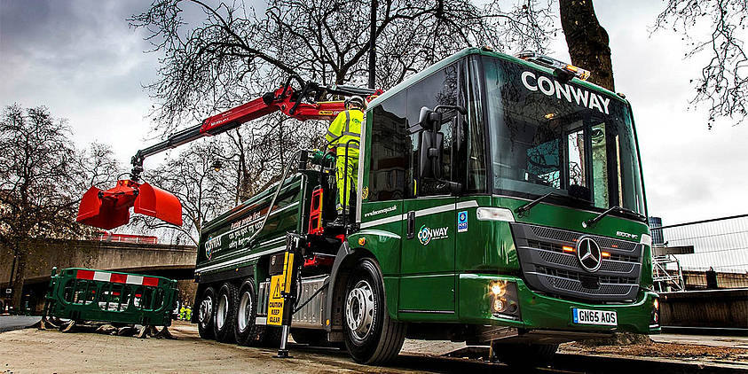 FM Conway Ltd uses two highly sophisticated Mercedes-Benz Econic 3235 8x4 tippers with crane and clamshell bucket.